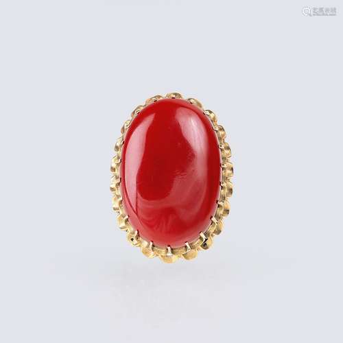 A large Coral Ring.