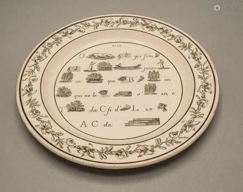 Rebus Teller / A creamware plate with rebus / puzzle, wohl C...