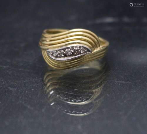 Damenring mit Diamanten / A ladies 14ct gold ring with diamo...