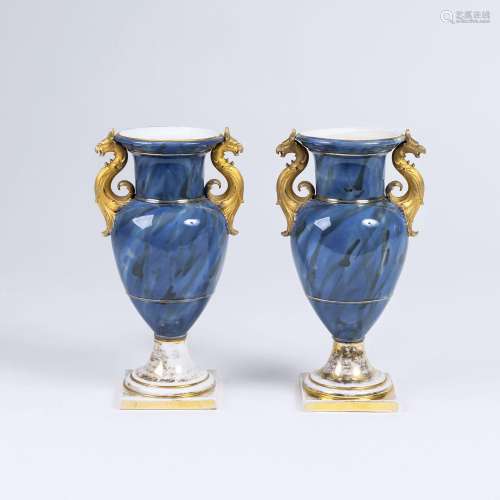A Pair of 'French Vases' with Grip Head Handles.