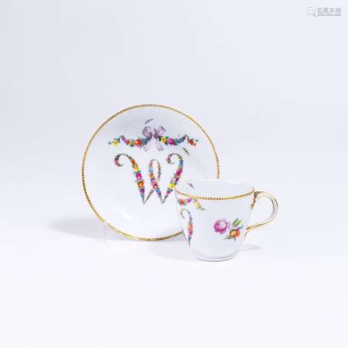 A Cup with Flower Monogram 'W'.