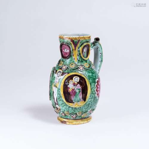 A Faience Jug with Crucifix.