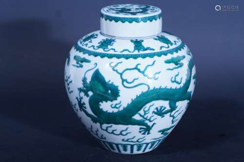 A green glazed Dragon Jar