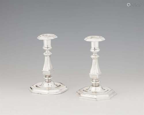 A pair of Berlin silver candelsticks from the dinner service...