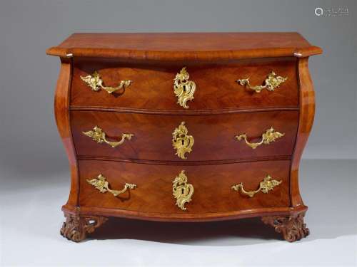 An ormolu mounted mahogany chest of drawers