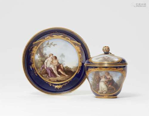 A Meissen porcelain cup and saucer with scenes after Angelik...