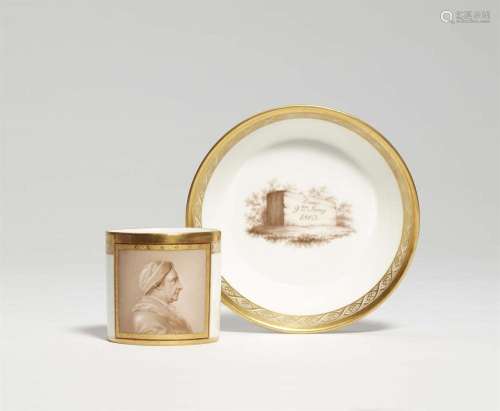 A Berlin KPM porcelain cup with a portrait of Joachim Wincke...