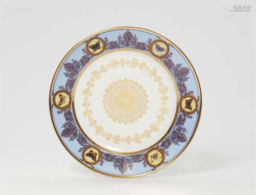 A rare Sèvres porcelain plate from a dinner service with pal...