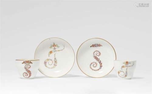 Two Meissen porcelain cups and saucers monogrammed S and T