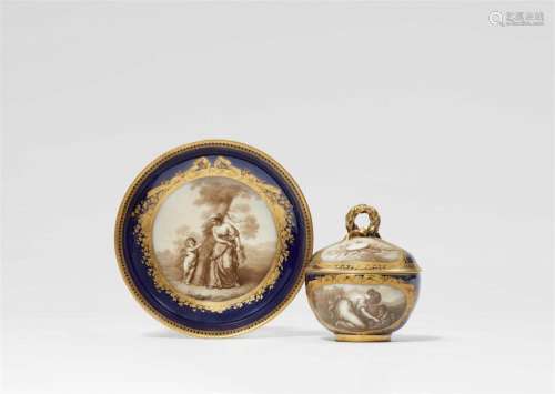 A Meissen porcelain cup and saucer with scenes after Angelik...