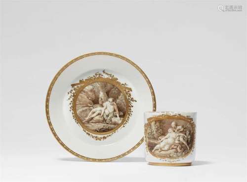 A Meissen porcelain cup and saucer with mythological scenes