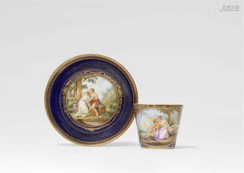 A Meissen porcelain cup and saucer with scenes after Angelik...