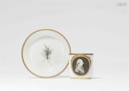 A Meissen porcelain cup and saucer with a portrait of Empero...