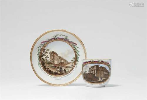 A Meissen porcelain cup and saucer with Greek and Roman ruin...