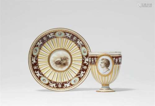 A Meissen porcelain cup and saucer with Ganymede