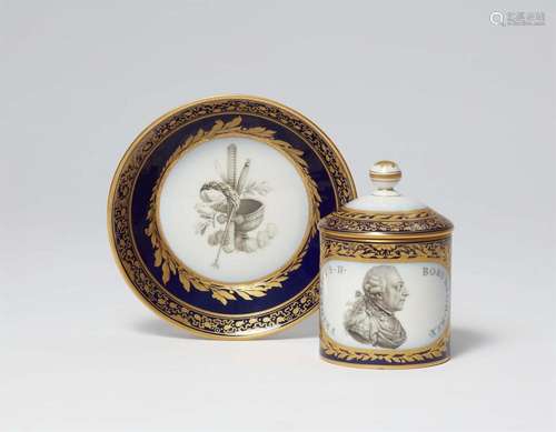 A Berlin KPM porcelain cup with a portrait of Frederick II