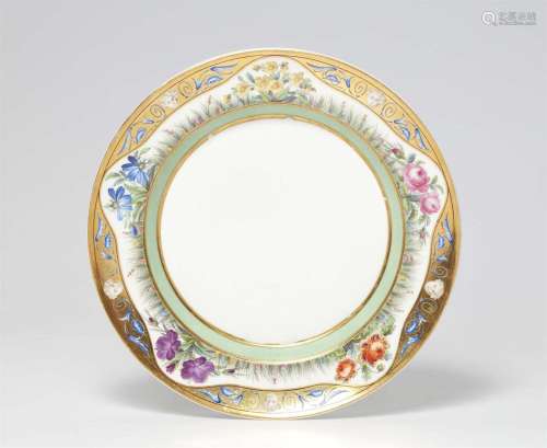 A Berlin KPM porcelain dinner plate from a service with &quo...