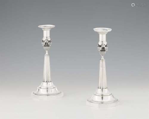 A pair of Neoclassical Berlin silver candlesticks