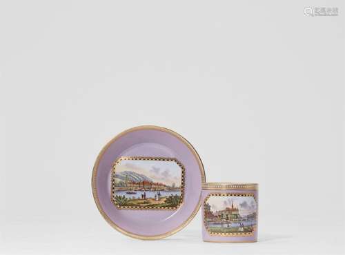 A Meissen porcelain cup and saucer with views of Albrechtsbu...