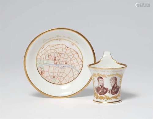 A Berlin KPM porcelain cup commemorating the entry of the al...