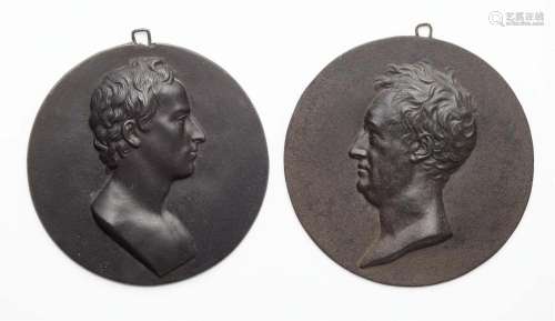 Two cast iron portrait plaques of Goethe and Schiller