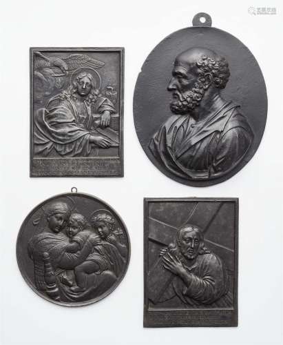 Four cast iron religious plaques