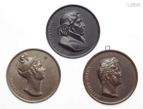 Three cast iron portrait medallions by Johann Friedrich Gott...