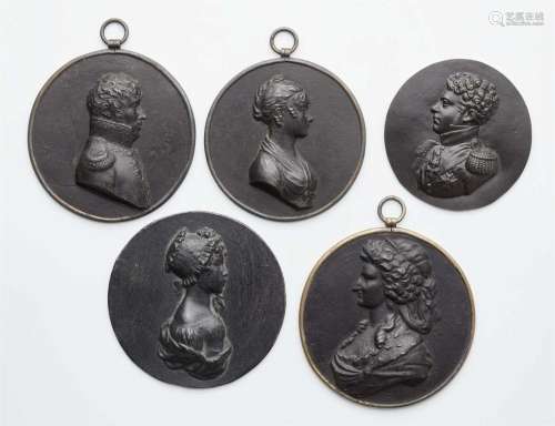 Five cast iron portrait plaques