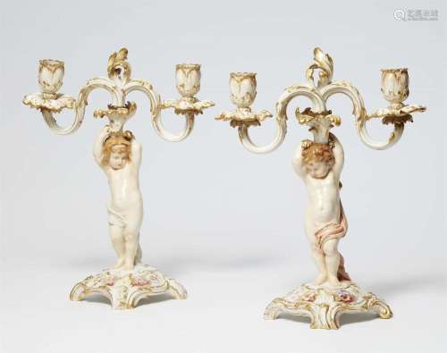 A pair of Berlin KPM porcelain candlesticks with "weich...