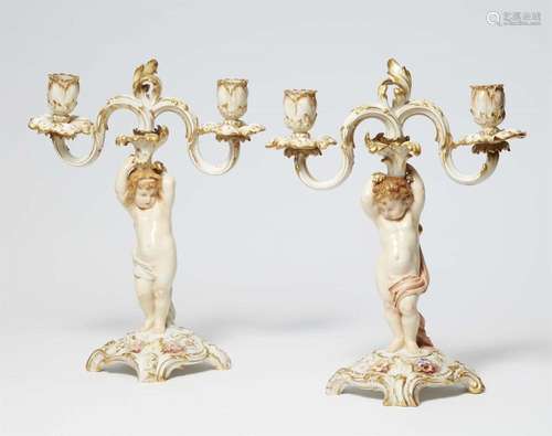 A pair of Berlin KPM porcelain candlesticks with "weich...