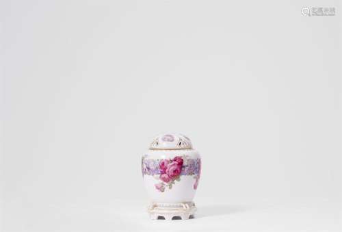 A Berlin KPM porcelain tea caddy with floral decor