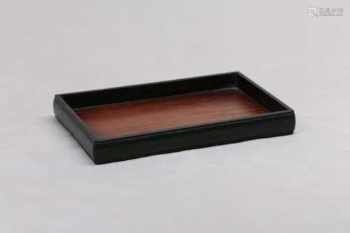 A CHINESE ZITAN WOOD TRAY. The tray of low rectangular form