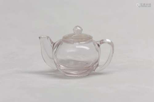 A CHINESE ROCK CRYSTAL TEAPOT AND COVER. The well-hollowed g...