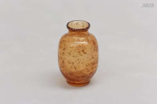 A CHINESE GOLD-FLECKED AMBER GLASS JAR. With an ovoid body f...