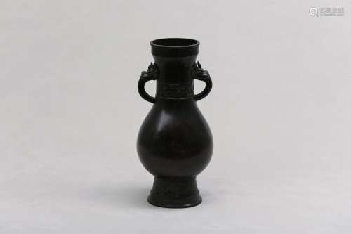 A CHINESE BRONZE VASE. Yuan / early Ming Dynasty. The tall f...