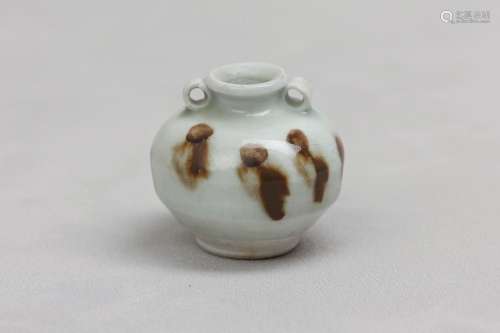A CHINESE RUSSET-SPLASHED QINGBAI JARLET. Song Dynasty. The ...