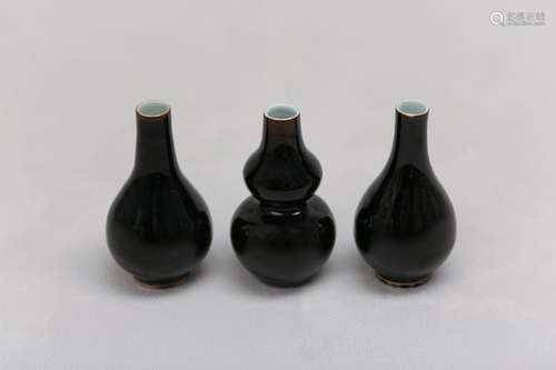 THREE CHINESE MIRROR BLACK-GLAZED VASES. Qing Dynasty