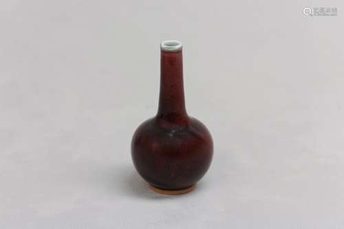 A CHINESE COPPER-RED BOTTLE VASE. Qing Dynasty