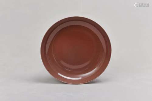 A CHINESE COPPER RED-GLAZED DISH. Qing Dynasty