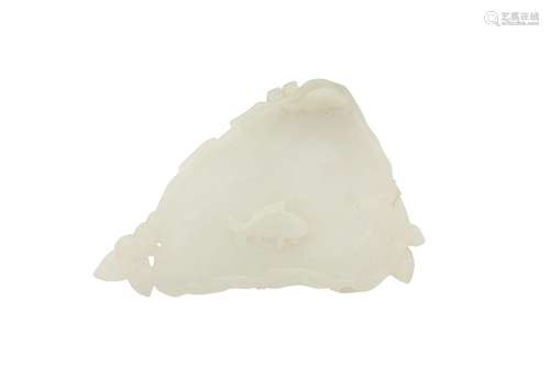 A CHINESE CARVED JADE ‘LOTUS LEAF’ WASHER. Qing Dynasty, 19t...