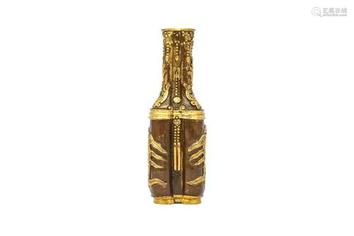 A CHINESE GILT-BRONZE TOOL VASE. Qing Dynasty, Qianlong mark...