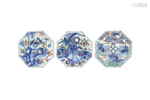 A SET OF THREE CHINESE OCTAGONAL WUCAI TILES. Ming Dynasty, ...