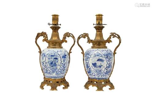 A PAIR OF CHINESE ORMOLU-MOUNTED BLUE AND WHITE JARS. Qing D...