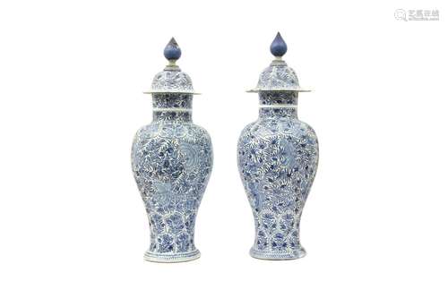 A PAIR OF LARGE CHINESE BLUE AND WHITE VASES AND COVERS. Qin...