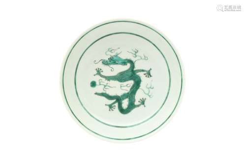 A CHINESE GREEN-ENAMELED 'DRAGON' DISH. Qing Dynasty, Guangx...