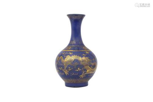 A CHINESE POWDER-BLUE GILT-DECORATED 'DRAGON' BOTTLE VASE. Q...