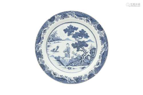 A MASSIVE CHINESE BLUE AND WHITE FIGURATIVE CHARGER. Qing Dy...
