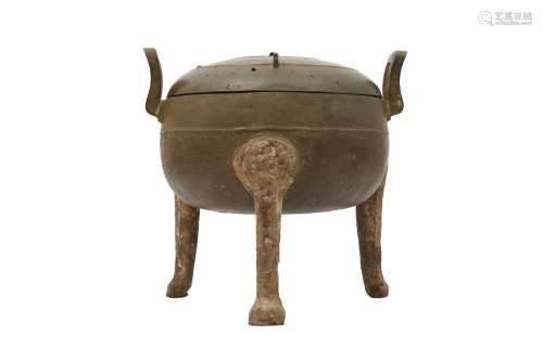 A CHINESE BRONZE DING WITH IRON LEGS AND A COVER. Han Dynast...