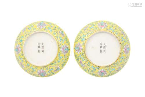 A PAIR OF CHINESE FAMILLE ROSE YELLOW-GROUND 'LOTUS' DISHES....