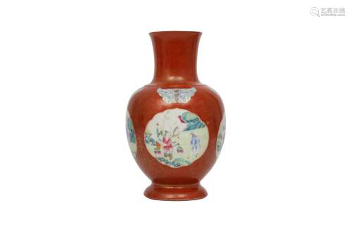 A CHINESE GILT-DECORATED SALMON-RED VASE. Qing Dynasty, Jiaq...